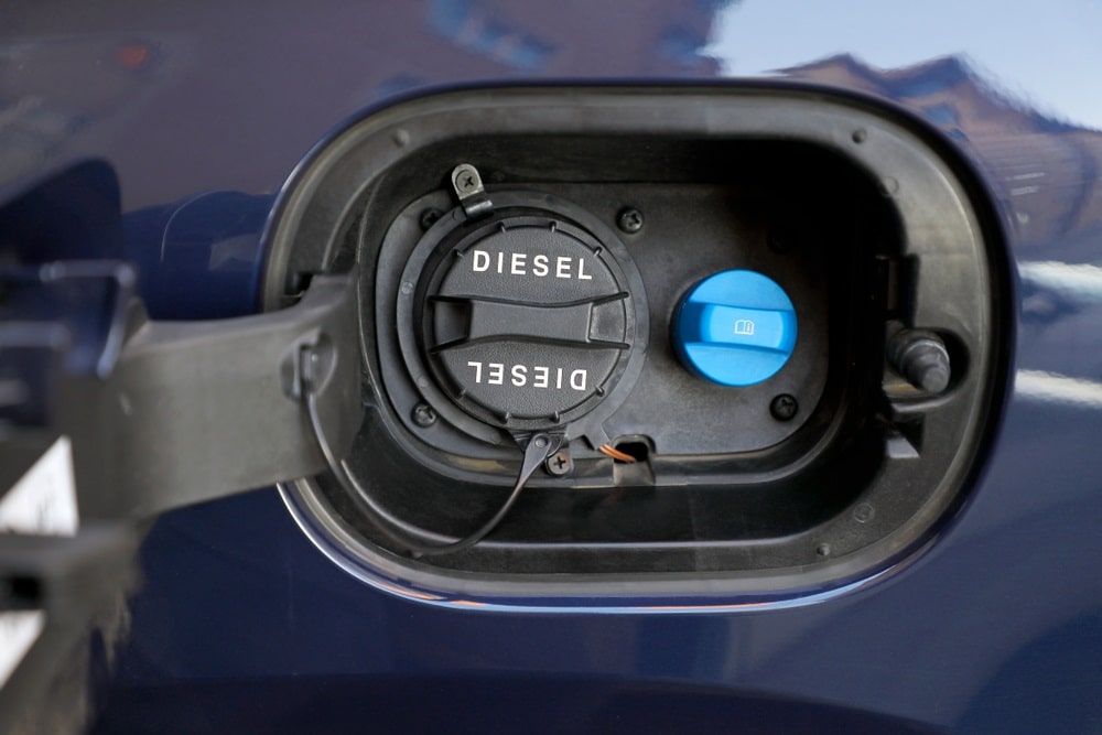 Diagram of a diesel engine illustrating the role of AdBlue in reducing emissions.