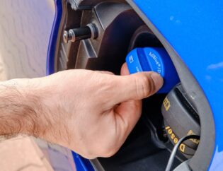 A dashboard warning light indicating low AdBlue levels in a diesel vehicle.