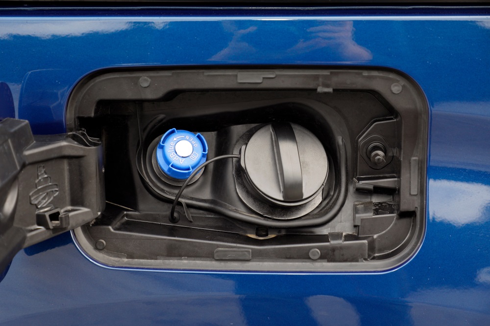 Diesel fuel tank with DEF label and filling nozzle