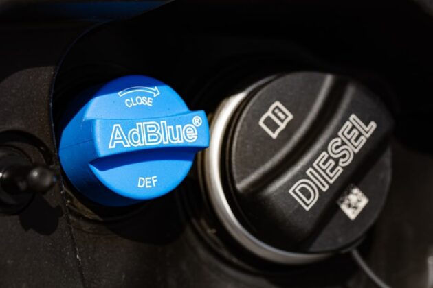 AdBlue tank in a BS6 diesel engine showing SCR emission system setup.