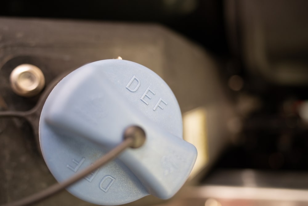 Diesel engine exhaust pipe with DEF logo 