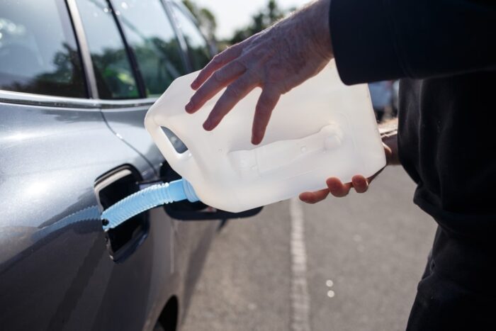 Diesel engine exhaust pipe with DEF logo