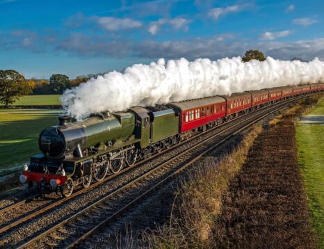 Modern railroad engine with DEF tank system for emissions control