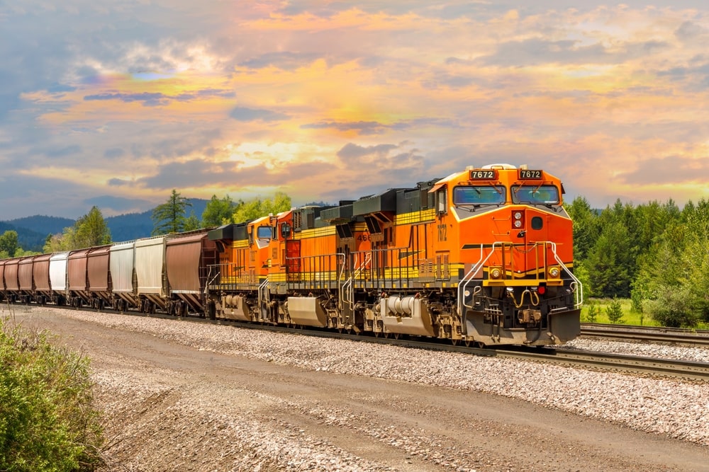 Modern railroad engine with DEF tank system for emissions control