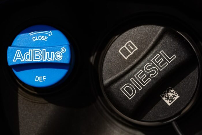 Diesel truck being refilled with diesel exhaust fluid (DEF)