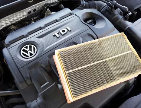 2015 Volkswagen Golf TDI diesel vehicle parked, showing emissions badge