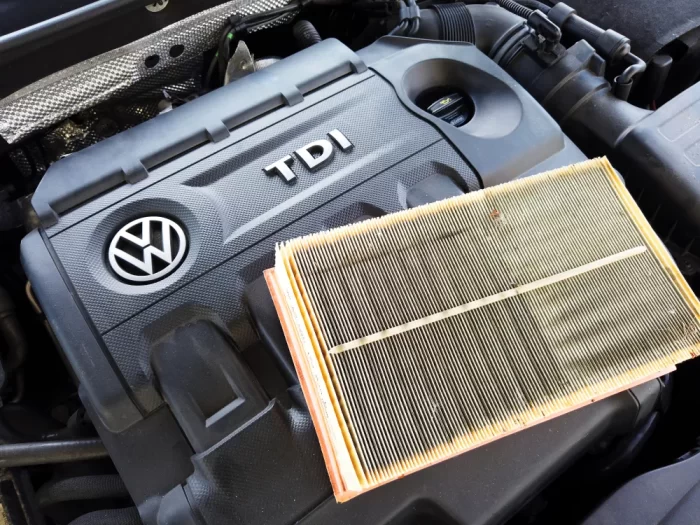 2015 Volkswagen Golf TDI diesel vehicle parked, showing emissions badge