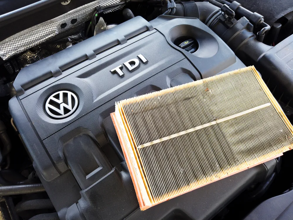 2015 Volkswagen Golf TDI diesel vehicle parked, showing emissions badge