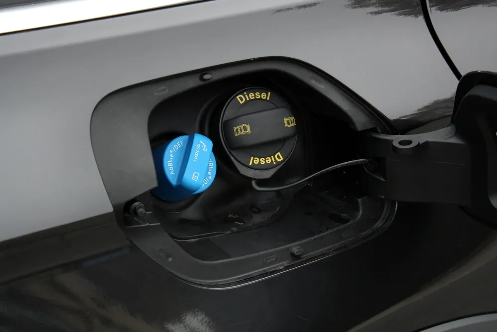 Diesel vehicle dashboard showing an AdBlue warning indicator